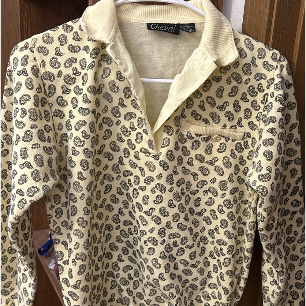 Women’s top. Pale yellow in color. Rarely worn.